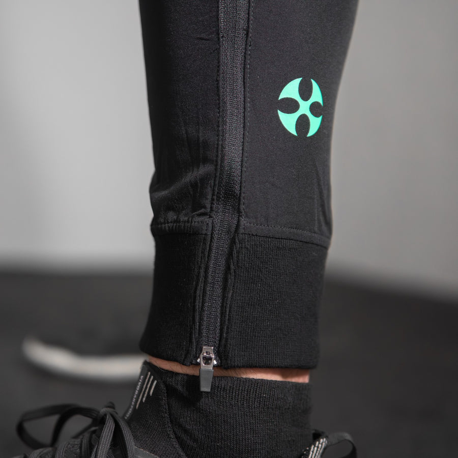 reyllen X1 unisex man woman joggers black nylon stretchy lower leg logo detail shot