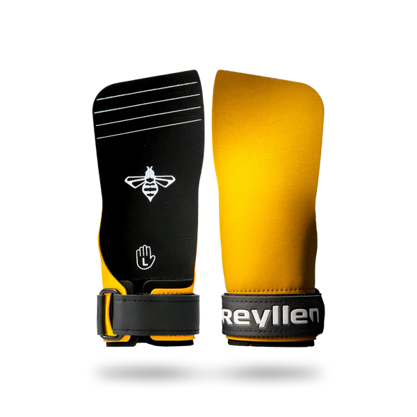 Pair of Reyllen Bumblebee Pro Grips, black front face with a bee emblem and gold reverse, on a black and yellow wrist cuff