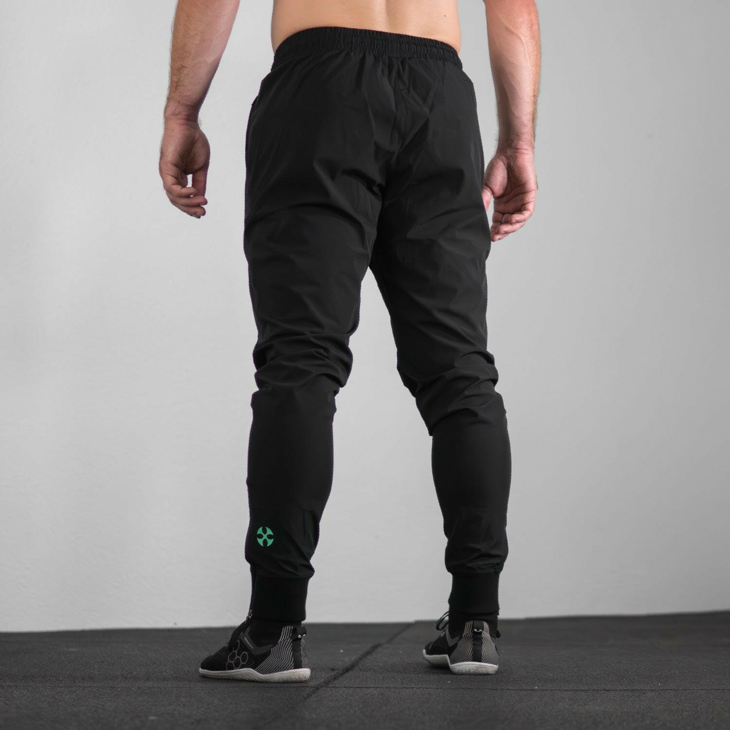 reyllen X1 unisex man woman joggers black nylon stretchy back view