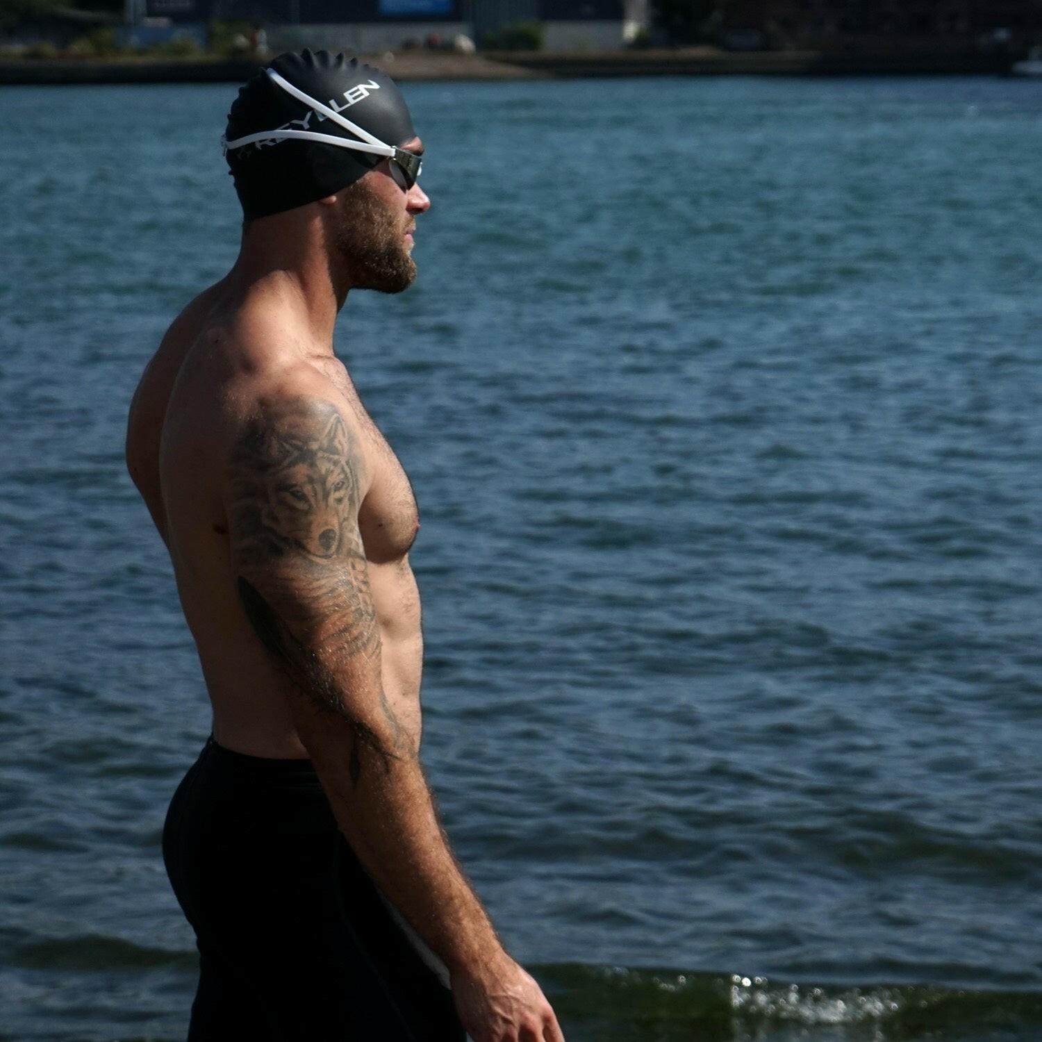 reyllen classic black swim cap modelled by man