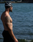reyllen classic black swim cap modelled by man