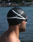 reyllen classic style black swim cap closeup