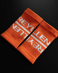 reyllen crossfit lifting sweat bands wrist bands orange pair angle view